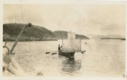 Image of Oomiak [umiak], Woman's boat, with sail up